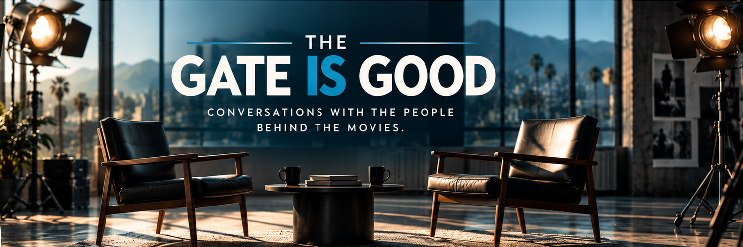 The Gate is Good. Conversations with the people behind the movies. Two lounge chairs face a table in a warmly lit film studio.